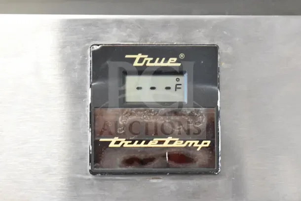 True TS-49 commercial cooler control panel with temperature display, featuring "truetemp" branding.