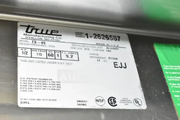 True TS-49 commercial cooler label; 115 volts, 1 phase, NSF listed, uses R134A refrigerant, serial 1-2626587.