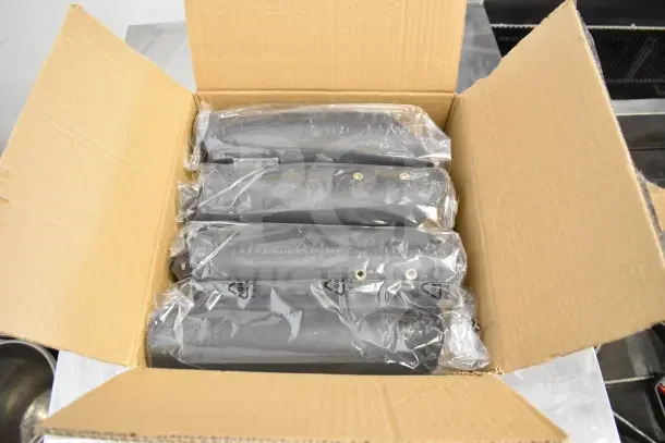 Box with packaged components of a Bighorn 24" Mini Ranch Fire Pit; labeled as brand new scratch and dent.
