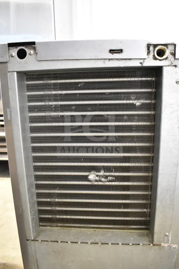 Hoshizaki KM-350MAJ crescent cube ice machine head. 387lb capacity, 115V, 1 Phase. Visible wear, functional components shown.