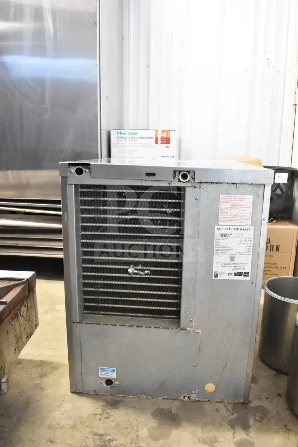 Hoshizaki KM-350MAJ ice machine head, 387lb capacity, crescent cube, 115V, 1 phase, visible wear, manufacturer's label shown.