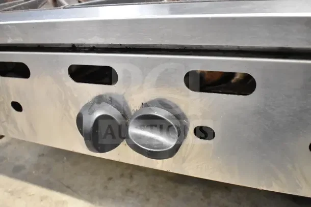 Vulcan commercial countertop 6-burner gas range, featuring control knobs and durable stainless steel panel. Appears gently used.