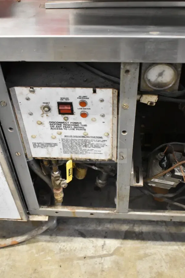 Vulcan VL2GPS commercial steam cabinet, natural gas powered, dual deck, 170,000 BTU, visible control panel and operating instructions.