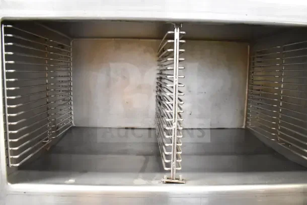 Vulcan VL2GPS commercial gas-powered steam cabinet interior; dual racks, stainless steel, 170,000 BTU, excellent condition.