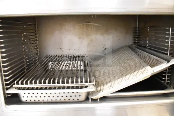 Vulcan VL2GPS commercial steam cabinet interior with racks and pans, showing natural gas setup. 170,000 BTU, used condition.