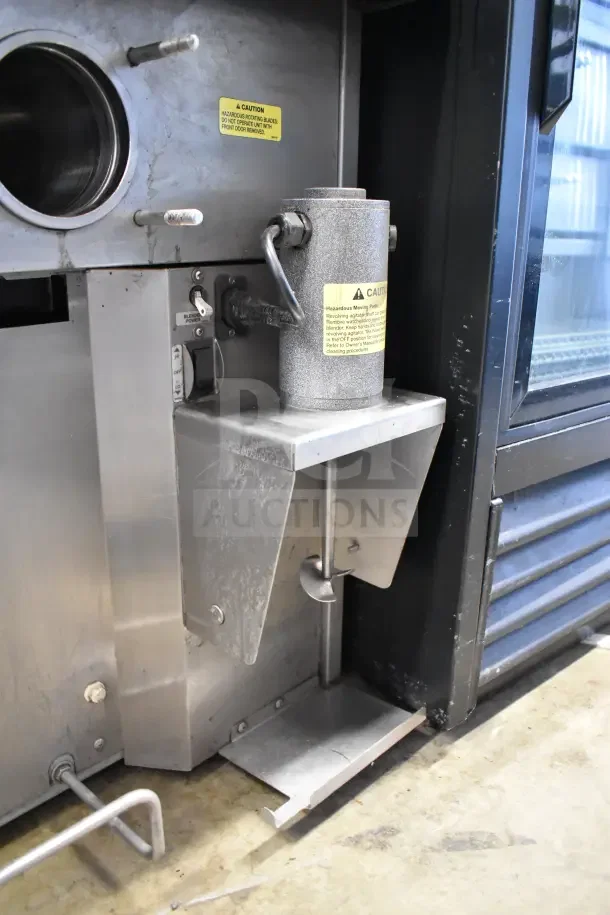 Stoelting commercial soft serve machine with two flavor twist, drink mixer, stainless steel, 208/240V, visible safety labels.
