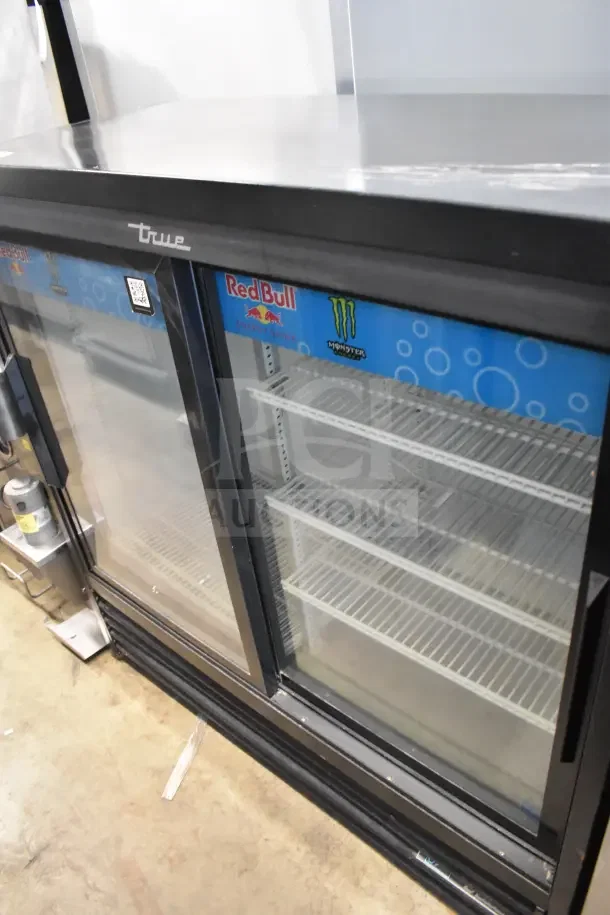 2020 True GDM-41SL-48-HC-LD commercial reach-in cooler, 2 glass doors, logo decals, interior shelves, 115V, 1 phase.