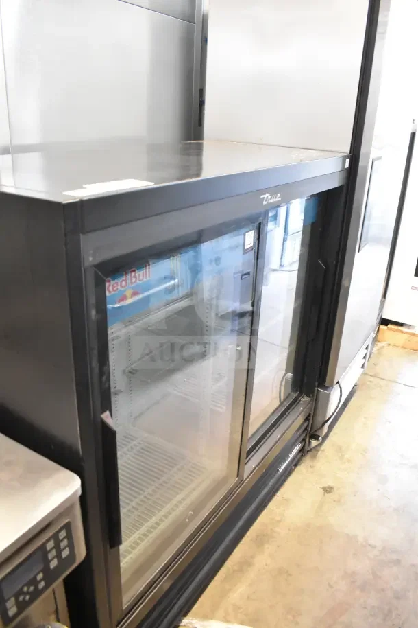 2020 True GDM-41SL-48-HC-LD commercial 2-door cooler, black exterior, glass doors, 115V, 1 phase, good condition.