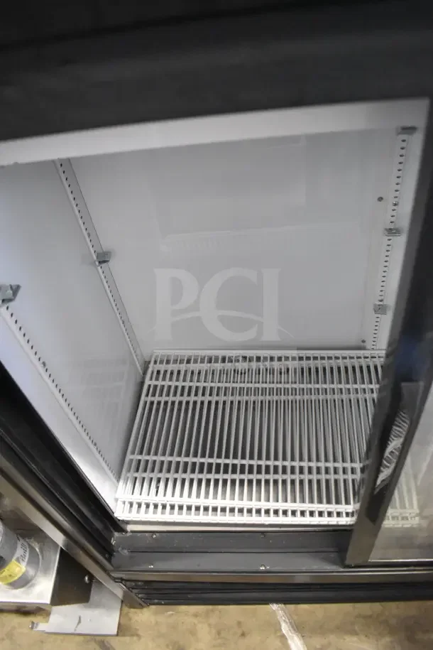 2020 True GDM-41SL-48-HC-LD commercial cooler, 2 glass doors, white shelves, excellent condition, 115V, 1 phase.