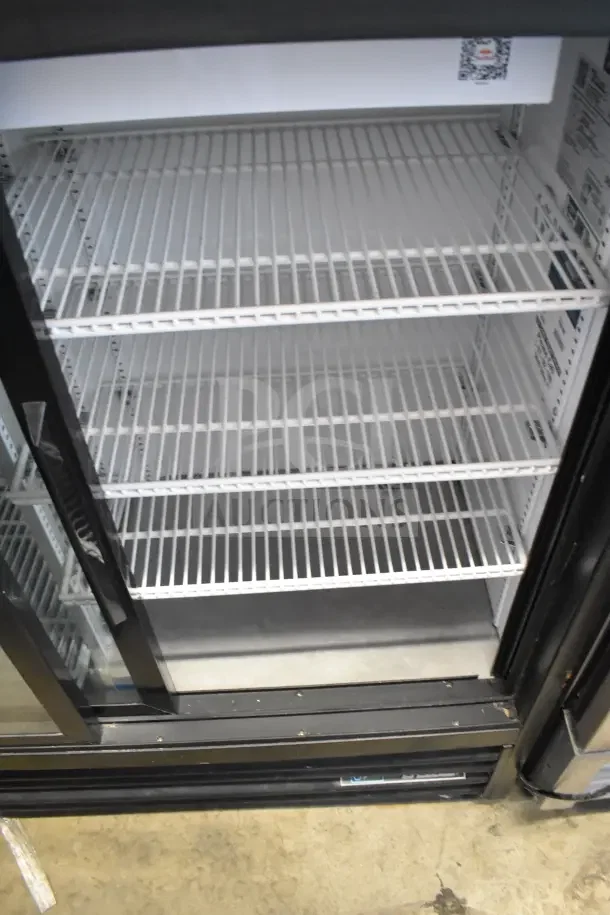 2020 True GDM-41SL-48-HC-LD commercial 2-door cooler, white shelves, 115 volts, clean condition, visible interior labels.