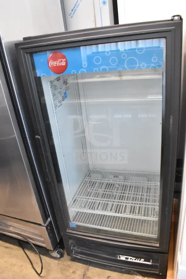 2016 True GDM-10-LD commercial single door cooler, clean interior, Coca-Cola branding, 115V, 1 Phase, good condition.