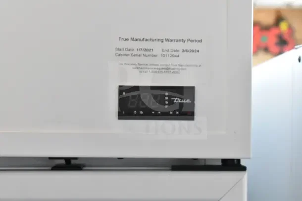2021 True TSCI-600R-G-PH Single Door Reach In Cooler, digital display, warranty label shows expiration 2/6/2024.