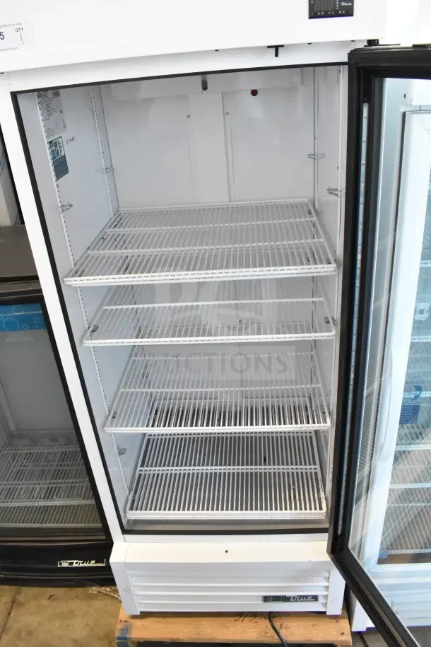 2021 True TSCI-600R-G-PH Commercial Single Door Reach-In Cooler, 115V, open door with five wire shelves, minor wear.