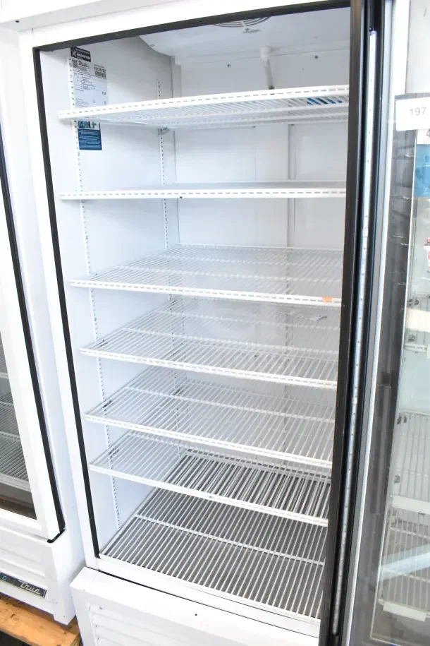 2021 True TSCI-600R-G-PH commercial cooler merchandiser, single glass door, six shelves, 115V, excellent condition.