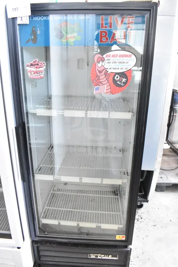 True GDM-12 single door commercial cooler, 115V, 1 phase, glass door, shelves, live bait decals, black trim.
