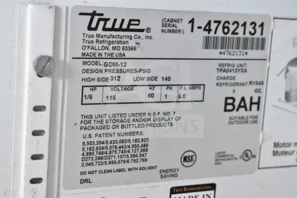 True GDM-12 cooler label showing model, voltage 115V, 1 phase, and specifications. NSF listed, made in USA.