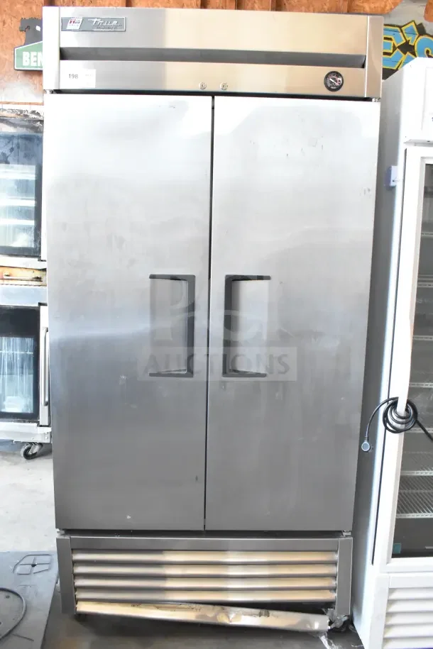 2017 True T-35 Commercial 2 Door Reach-In Cooler, stainless steel, 115 volts, 1 phase, used condition, prominent handles.