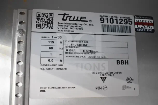 Label of 2017 True T-35 Commercial 2 Door Reach In Cooler, showing model, voltage, and compressor details.