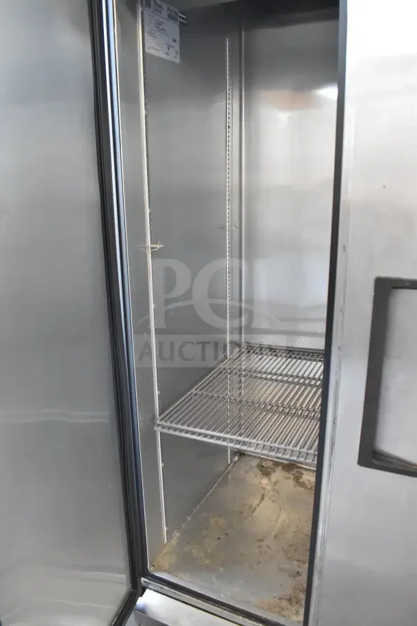 2017 True T-35 Commercial 2 Door Reach-In Cooler, 115 Volts, 1 Phase. Visible wear on interior surfaces.