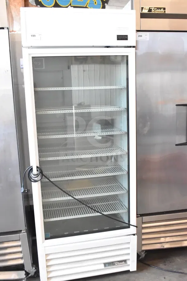2021 True TSCI-600R-G-PH commercial cooler. Single glass door, six shelves, 115V, 1 phase, excellent condition.