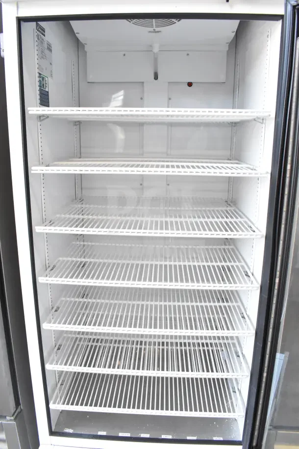 2021 True TSCI-600R-G-PH commercial cooler, single door, 115 Volts, clean interior, multiple shelves, excellent condition.