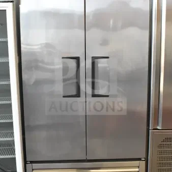 2016 True T-35 commercial 2-door reach-in cooler, stainless steel, on casters, 115V, 1-phase. Minor wear visible.