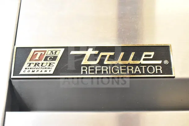 Chrome nameplate of a 2016 True T-35 Commercial 2 Door Reach In Cooler, showing "True Refrigerator" branding.