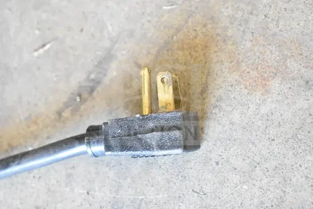 Power plug detail of 2016 True T-35 Commercial 2 Door Reach In Cooler, showing a standard 115-volt plug.