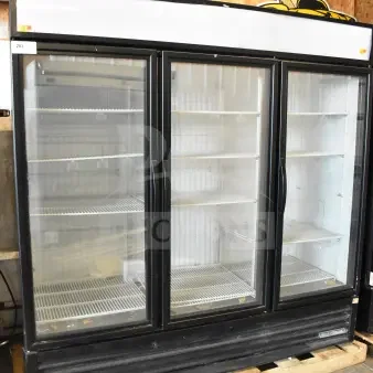 2018 True GDM-72F-HC commercial 3-door freezer merchandiser, black frame, glass doors, shelving, on wooden pallet.