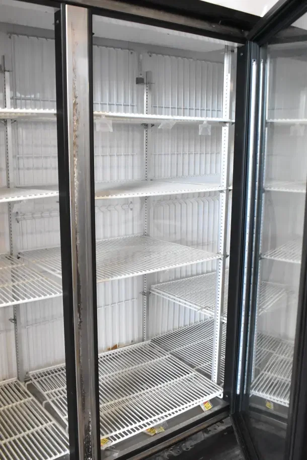 2018 True GDM-72F-HC commercial 3-door reach-in freezer, white shelves, good condition, 115V, 1 phase.