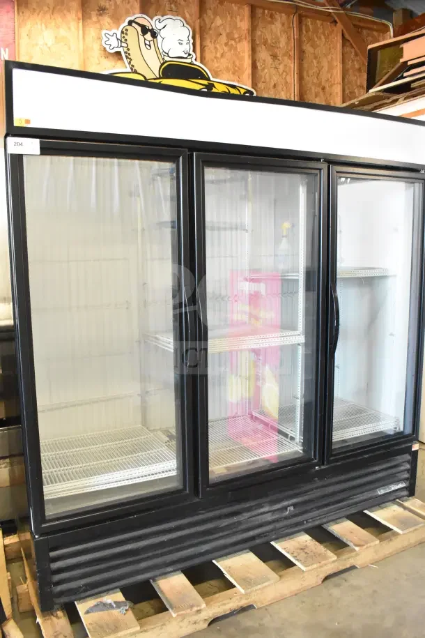 2018 True GDM-72F-HC commercial 3-door reach-in freezer merchandiser, 115/208-230V, 1 phase, glass doors, on pallet.