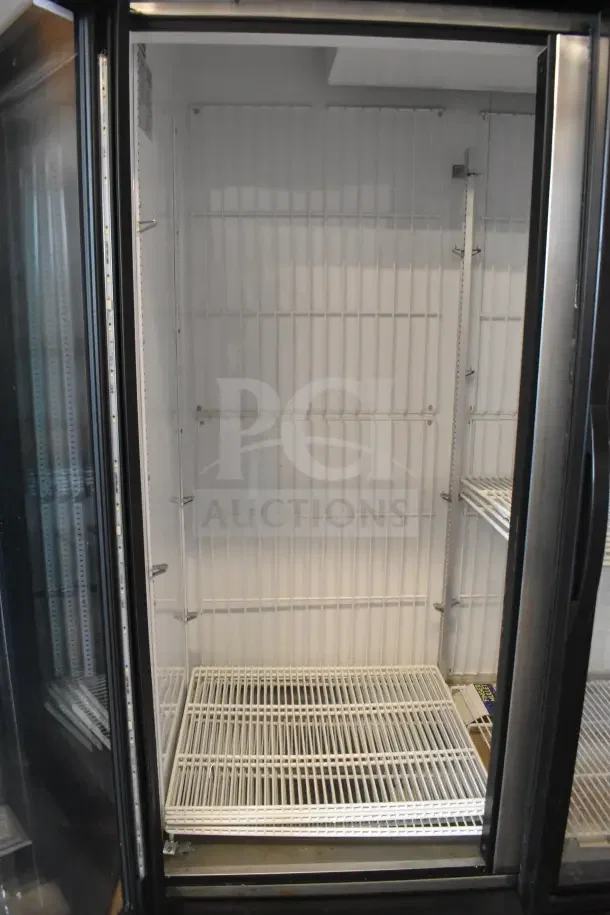 2018 True GDM-72F-HC Commercial 3 Door Reach In Freezer Merchandiser, clean interior, 115/208-230V, 1 Phase.