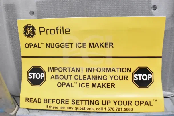 General Electric GE XPIO13SCESS Countertop Ice Maker with cleaning instructions tag. 120 Volts, 1 Phase.