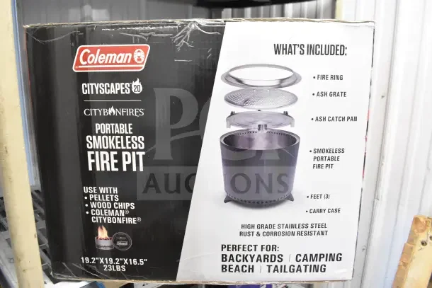 Brand new Coleman CCS-200 Portable Smokeless Fire Pit in box, includes fire ring, ash grate, ash pan, feet, carry case.