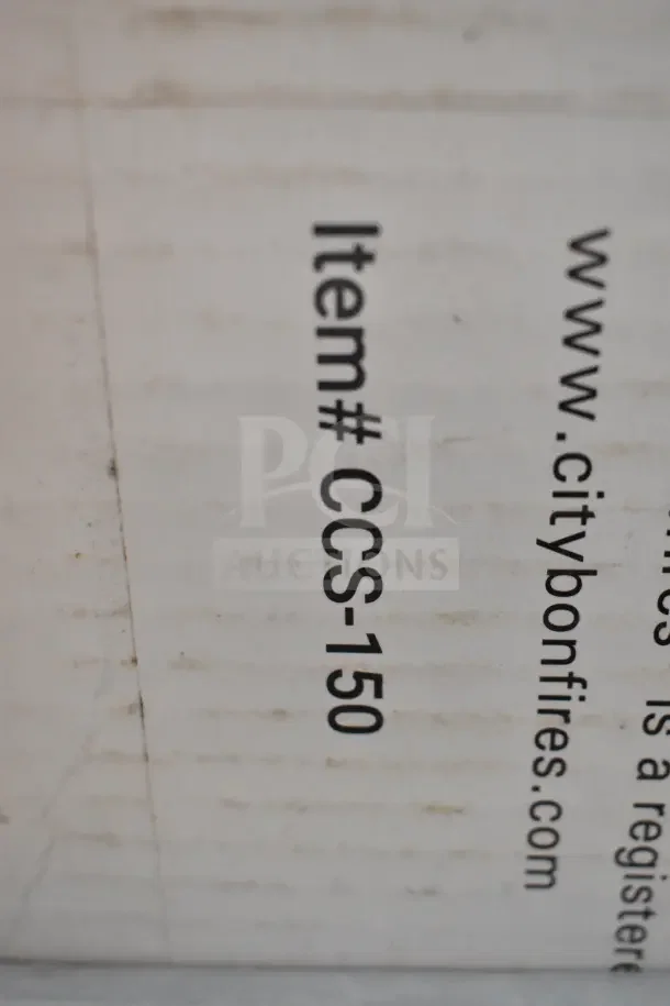 Coleman CCS-150 Portable Smokeless Fire Pit label, showing item number and part of a URL for product info.