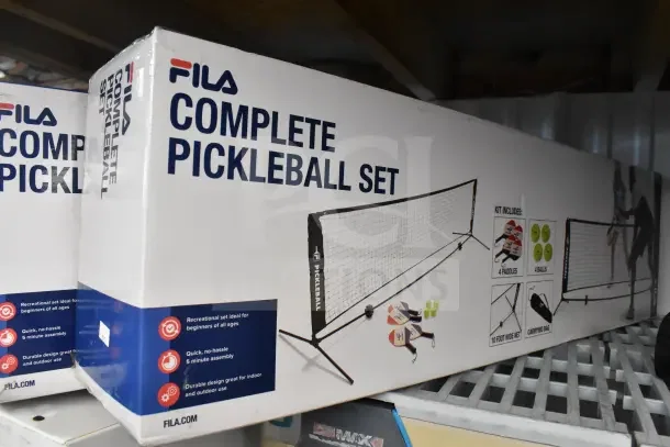 Fila Complete Pickleball Set, brand new in box. Includes 4 paddles, 4 balls, 10ft net, carrying bag. Ideal for all ages.