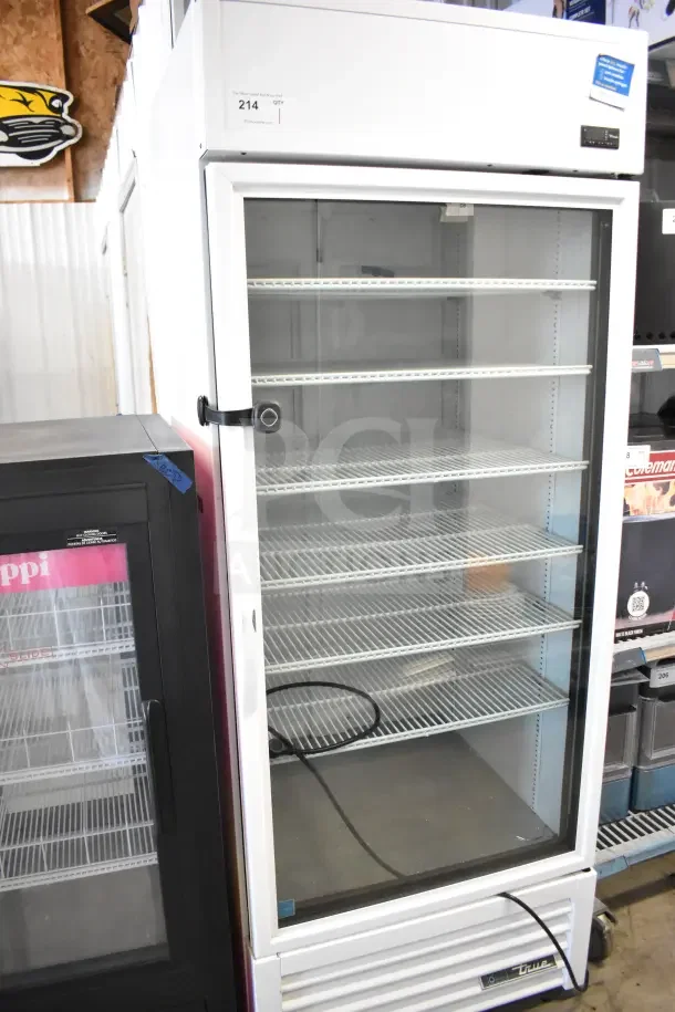 2021 True TSCI-600R-G-PH commercial single door reach-in cooler merchandiser. 115 volts, 1 phase, excellent condition.