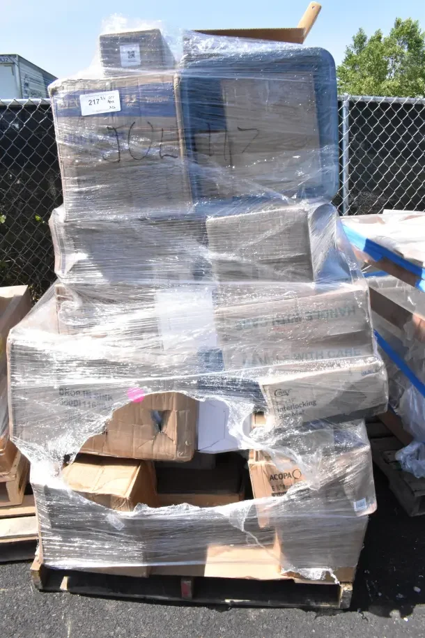 Palette of 26 new scratch and dent items, including bar mat, airpot, and glasses, wrapped in plastic. Boxes labeled.