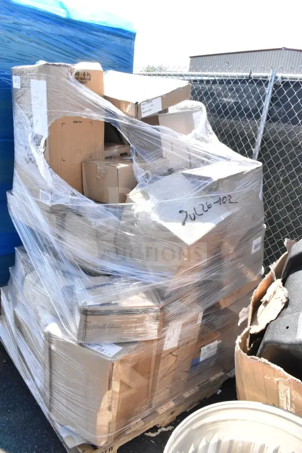 Plastic-wrapped pallet of 36 brand new scratch and dent items including glasses, cutting board, and casserole dish. Marked "JUL26-102."