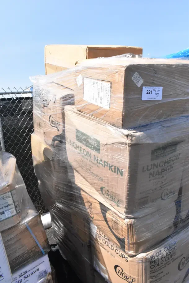 Pallet of 22 new scratch and dent items, includes cartons of Choice luncheon napkins and clear cold cups.