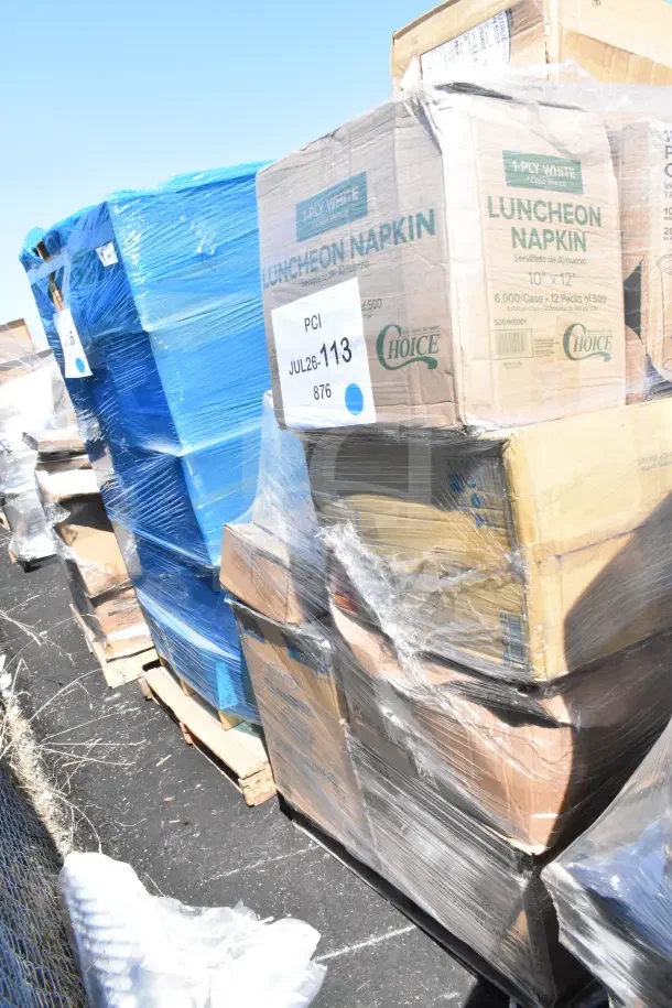 Boxes of mixed items, including luncheon napkins and 22 assorted scratch and dent products, sealed on pallets with labels.