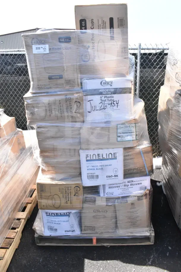 Pallet of new scratch and dent items including plastic bowls, cups, and paper bags. Various brands and sizes visible.