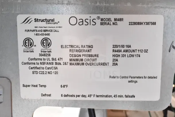 Structural Oasis MI48R commercial cooler label detailing model, electrical rating, refrigerant type, and certifications.