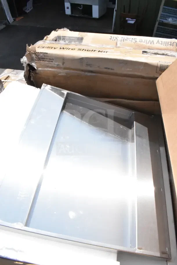 2 Avantco UC-F-120-A ice machines, new scratch and dent condition. Includes 19" air-cooled unit, 40 lb. storage bin. Boxes shown.