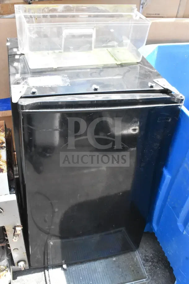 Mini black cooler, 115 volts, 1 phase. Features sturdy construction, minor surface wear. Ideal for compact storage.