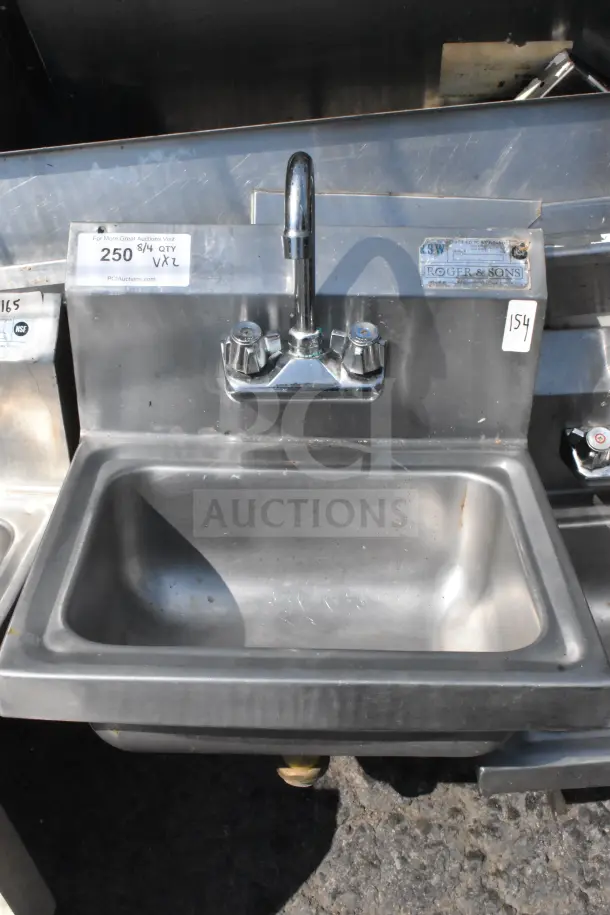 Commercial single bay wall mount sink with faucet and handles, metal construction, includes label showing brand Roger & Sons.