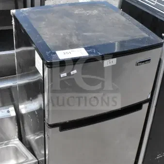 Magic Chef HMDR310SE Mini Cooler with Freezer, stainless steel finish, visible scratches, 120V, 1 Phase, model label intact.