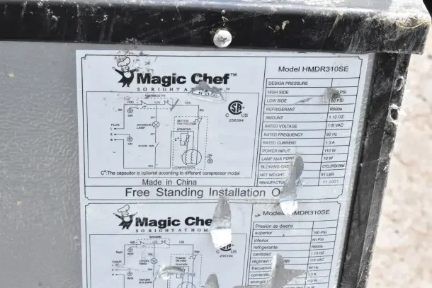 Magic Chef HMDR310SE Mini Cooler with Freezer. 120 Volts, single phase. Visible model label details. Slight wear.