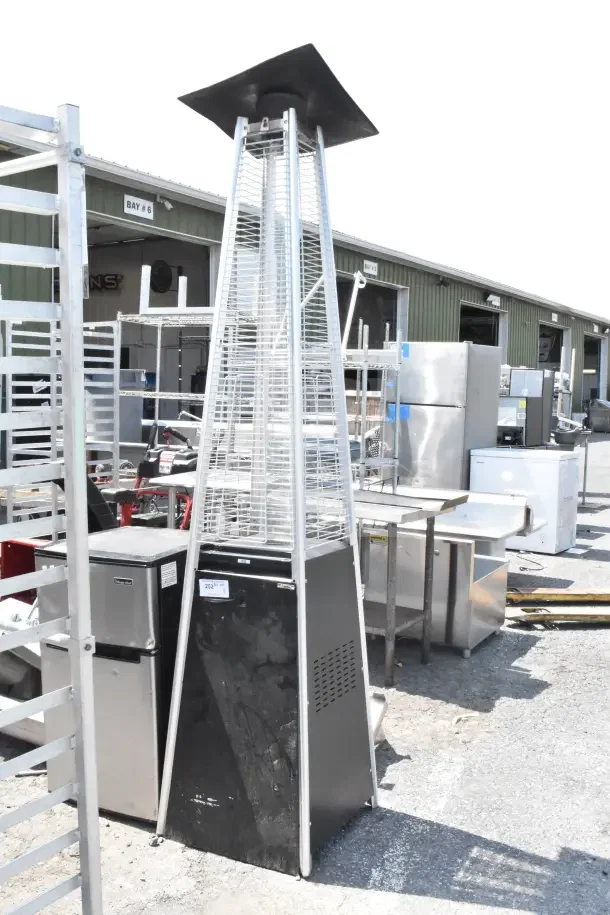 Nuu Garden Outdoor Propane Gas Heater, pyramid shape, steel construction, black base, silver grates, good condition.