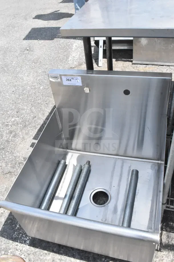 Steelton 522US12424 24"x24"x14" stainless steel utility sink, hole for 8" center faucet, with label, in good condition.